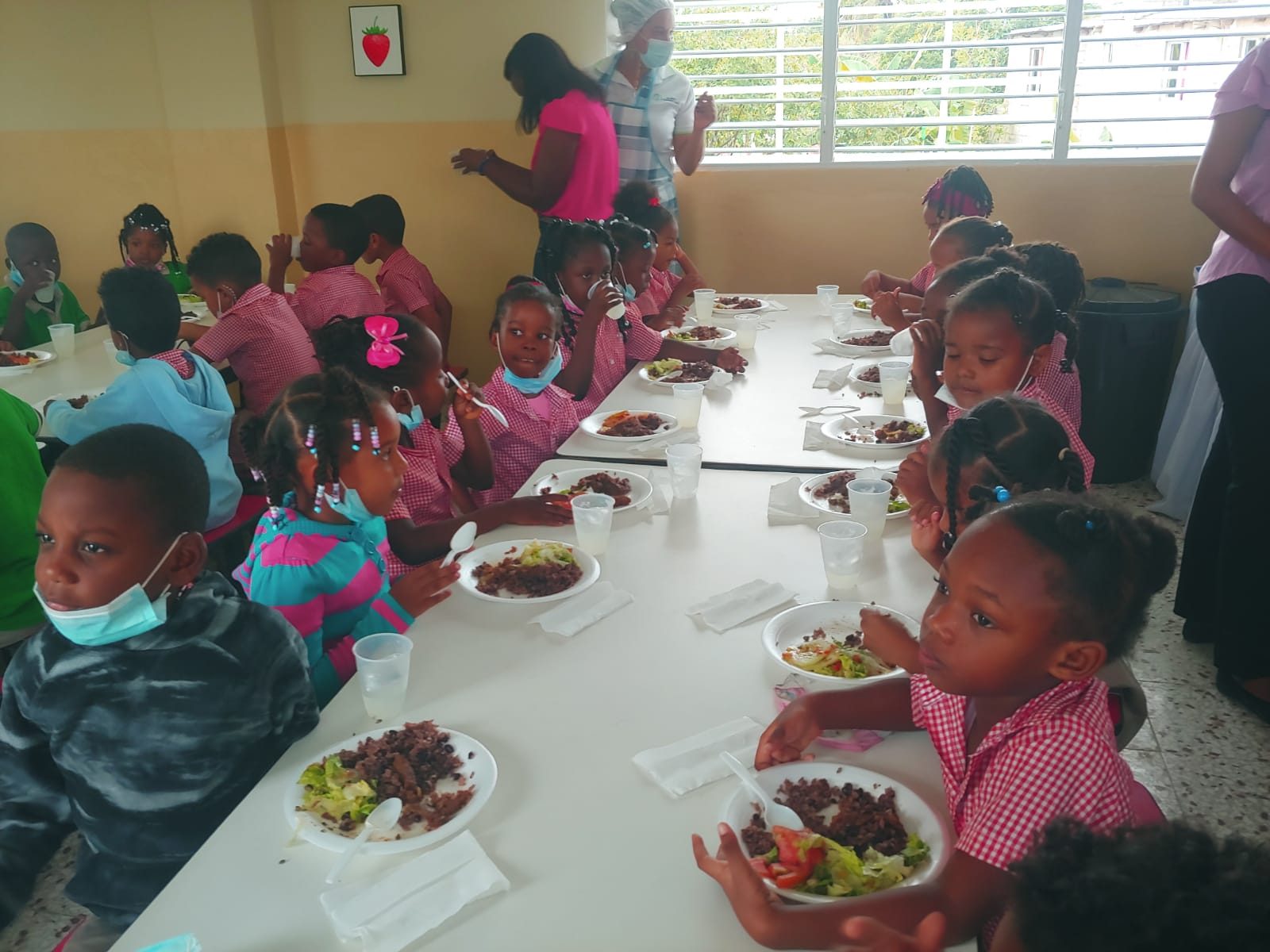 Students having lunch in the school cafeteria